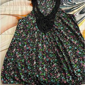 Women’s sleeveless top black with different color flowers size X-Large